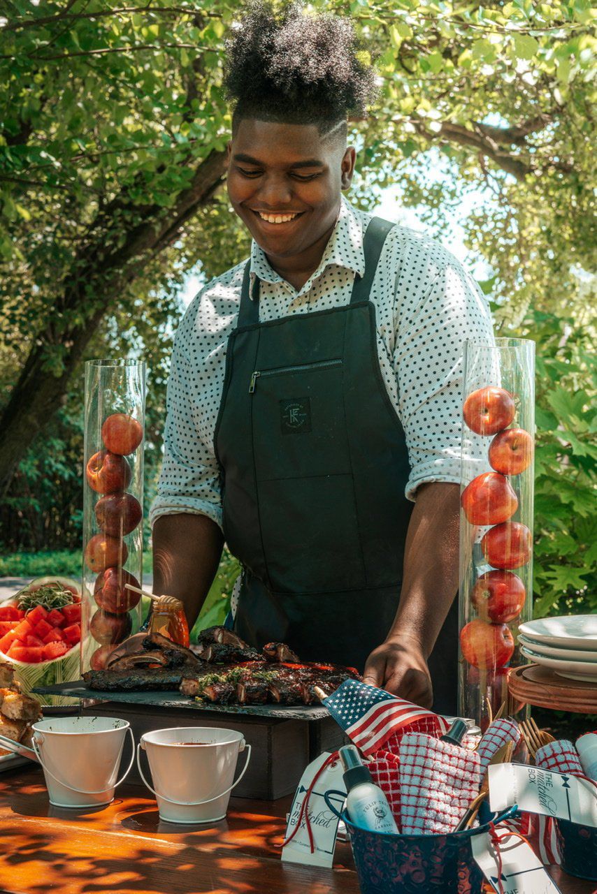 Juwan Rice prepares food